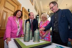Communities Minister Gordon Lyons is pictured with (L-R) Mayor of Derry City and Strabane District Council, Cllr Patricia Logue, Factory Girls representative Mary White and artist Chris Wilson
