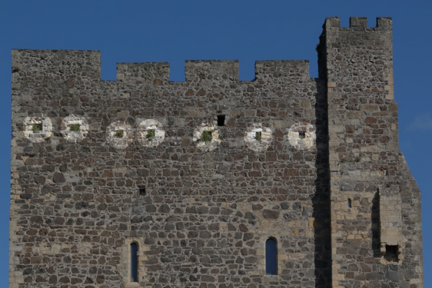 Carrickfergus Castle, Image showing seven holes in Keep walls
