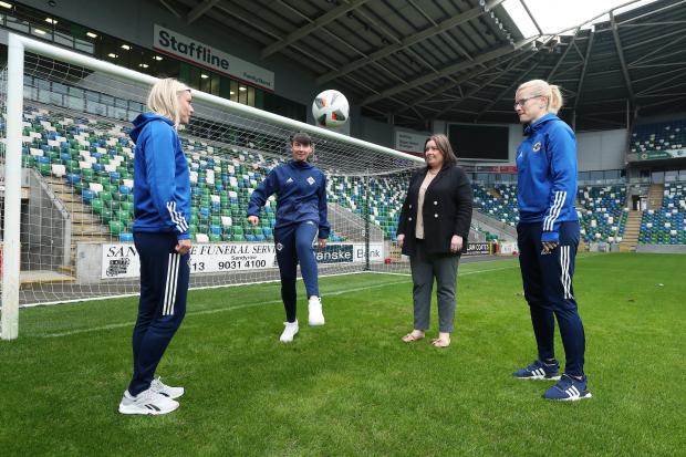 Communities Minister Deirdre Hargey is pictured with Nadene Caldwell, Toni Leigh Finnegan and Julie Nelson on the day that she announced that she has made £100,000 available to help promote female sport through football.
