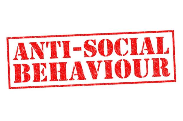 Anti-Social Behaviour text on plain background