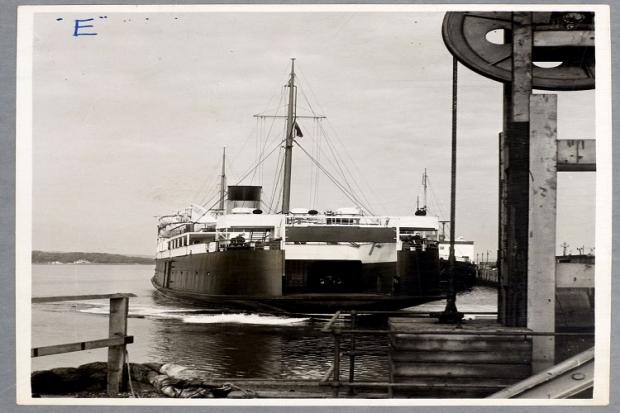 MV Princess Victoria backing into a pier at Stranraer in September 1949 in black and white
