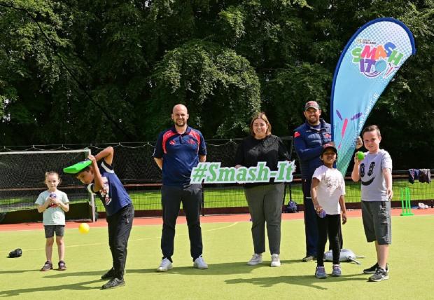 Communities Minister Deirdre Hargey is pictured at the Northern Cricket Union summer camp with Chris Taylor, Club and Participation Development Manager, Callum Atkinson, Operations Manager and some of the children attending the scheme