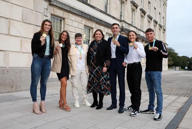 Communities Minister Deirdre Hargey is pictured with Commonwealth medal winners