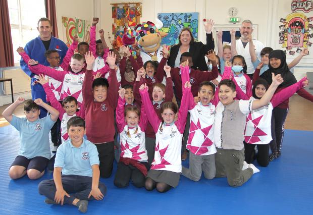 Communities Minister Deirdre Hargey is pictured on a visit Fane Street Primary School in Belfast where she met with pupils and the Birmingham Games Baton Relay Team ahead of the Commonwealth Games