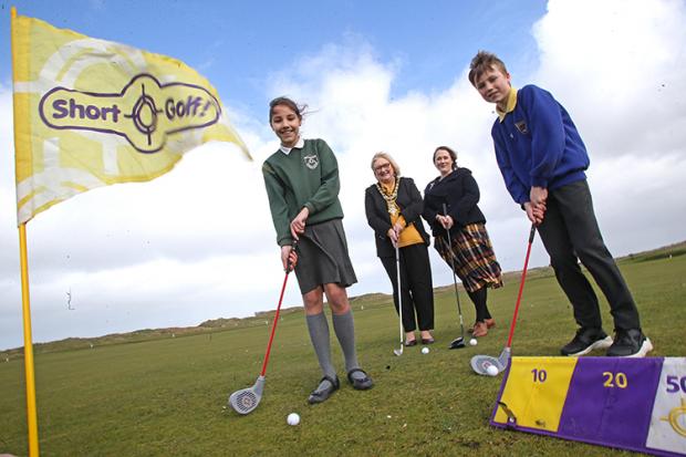 School children playing golf at the launch of the Legacy Primary Schools Golf Programme