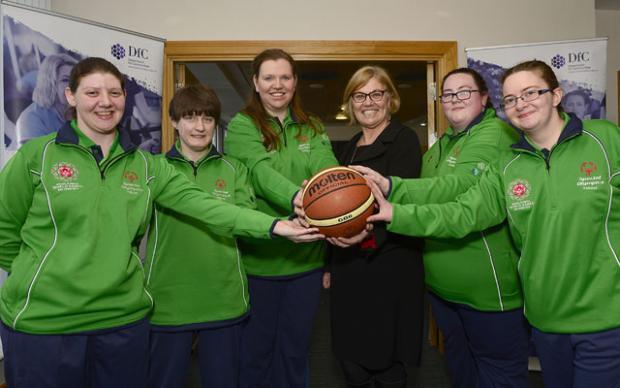 DfC Permanent Secretary Tracy Meharg with a number of athletes from Special Olympics Ulster