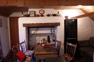 A typical example of a hearth in a vernacular dwelling which was at the heart of the home, providing warmth, a place for cooking and a social focus for gatherings, storytelling and singing