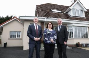 Communities Minister Gordon Lyons and Health Minister Mike Nesbitt are pictured with Anne-Marie Kelly during a visit to the Kelly home which was modified for Anne-Marie’s son Conor through the Disabled Facilities Grant.