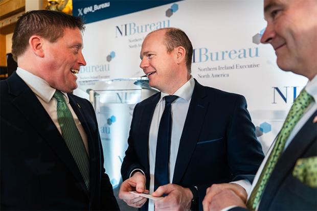 Minister Lyons networking at the NI Bureau Breakfast
