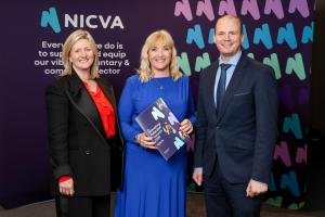 Communities Minister Gordon Lyons pictured with (left to right) Department for Communities Permanent Secretary Grainia Long and Chief Executive of NICVA Celine McStravick